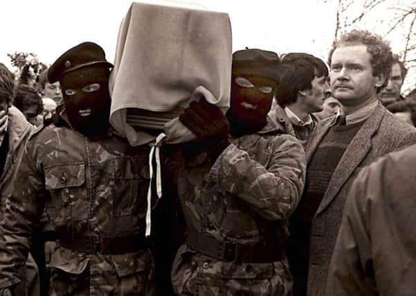 Martin McGuinness, seen here at an republican funeral in 1988, told a whopper of a lie over leaving the IRA in 1974
