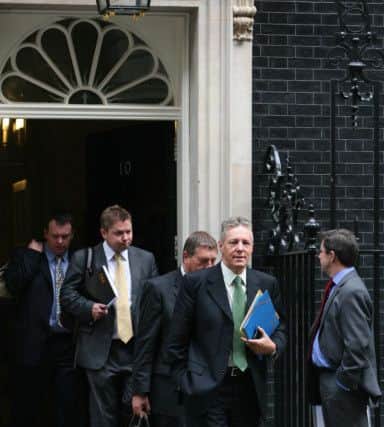(l-r) Advisers Richard Bullick and Timothy Johnston emerging from 10 Downing Street with Sammy Wilson and Peter Robinson