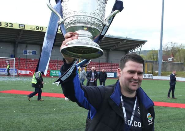 Linfield manager David Healy celebrates winning the Gibson Cup after defeating Cliftonville during last Saturday's Danske Bank Premiership match at Solitude. 
Picture by Brian Little/PressEye
