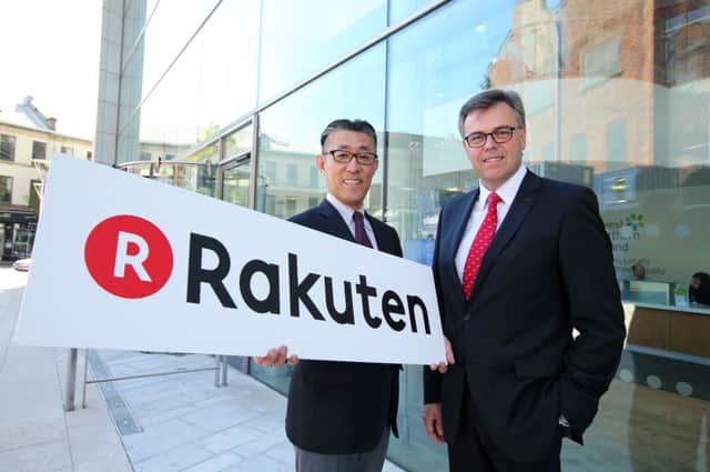 Yasufumi Hirai of Japanese firm Rakuten pictured with Invest NI chief executive Alastair Hamilton