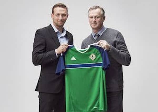 New Under 21 boss Ian Baraclough (left) is welcomed by Northern Ireland manager Michael O'Neill.