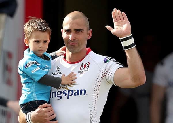 Ulster's Ruan Pienaar makes his way on to the pitch for his final PRO12 game with his son Jean Luc