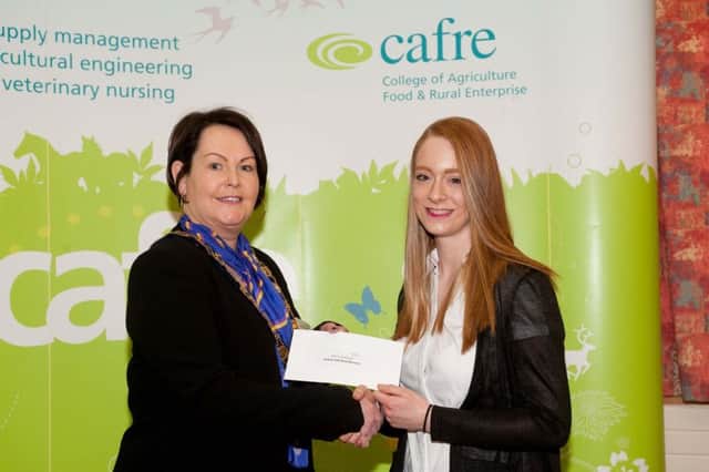 Councillor Mary Garrity, Chair of Fermanagh and Omagh District Council presenting the Jockey Hall Stud Bursary to Sophie Galloway at the recent CAFRE Enniskillen Careers Event.