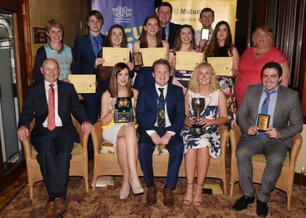 Newtownards YFC first place winners of the One Act Drama Festival and the Perpetual Challenge Cup. Also pictured are the winners of the Best Producer award Karen Patton (far left in back row) and Lynda Girvin (far right in back row). Winners of most promising actor, Andrew Patton (far right front row) and most promising actress, Emily Moore (middle, back row with plaque), YFCU president James Speers and judge Paul Bennington are also pictured