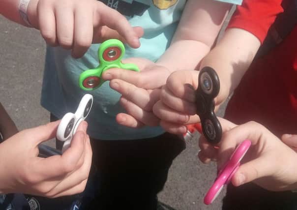 Fidget spinners are the must-have accessory at this years Balmoral Show