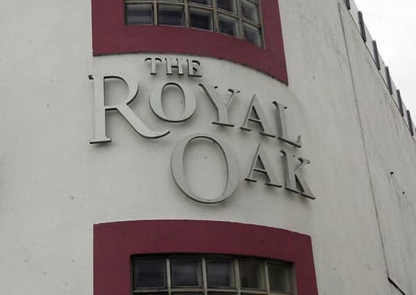 The alleged attack happened at the Royal Oak bar in Carrickfergus