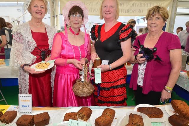 NI Women's Institute's (R-L) Margaret Kelso, Evelyn Armstrong, Roberta Mathers and Edith McAdams pictured during the annual Balmoral Show. Picture by Arthur Allison/Pacemaker