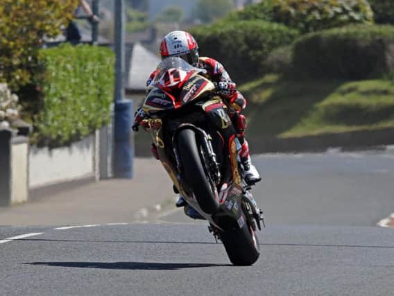 Michael Rutter on the Bathams SMT BMW during practice at the North West 200.