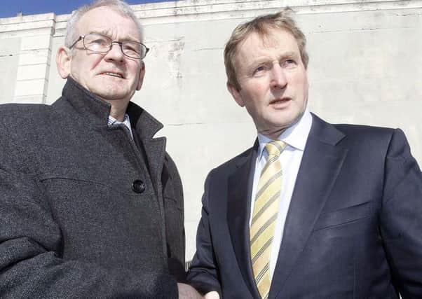 Alan Black (left) shook hands with Enda Kenny in March 2015 after the taoiseach promised all information on Kingsmills would be disclosed