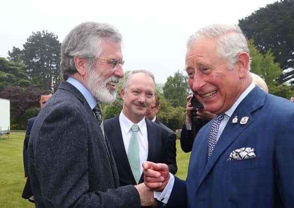 (Left-right) Sinn Fein leader Gerry Adams and Sean Haughey meet the Prince of Wales during a reception at Glencairn House, Dublin in the Republic of Ireland. Damien Eagers/PA Wire