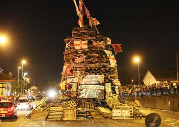 A 2016 bonfire with election posters placed on it at Lecky Road flyover in Londonderry