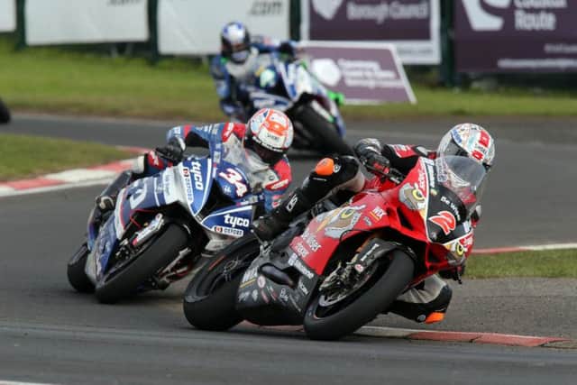 Glenn Irwin (PBM Ducati) leads Alastair Seeley (Tyco BMW) in the main Superbike race at the North West 200.