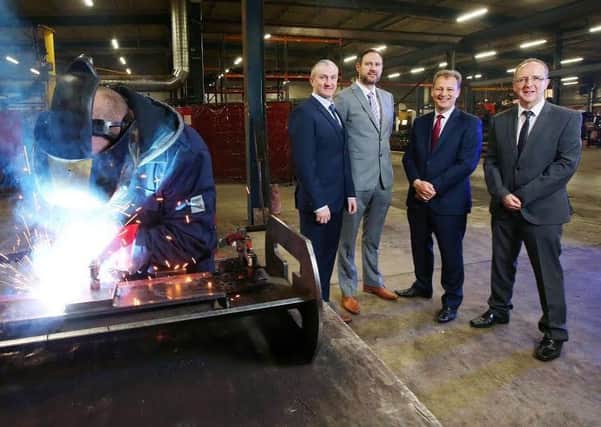 Pictured left to right: Barry O'Neill, Sales Director of GES; John McClenaghan, Managing Director of GES, Invest NIs Executive Director of Business & Sector Development, Jeremy Fitch and Des Gartland, Regional Director of Invest NI. Photo by Kelvin Boyes / Press Eye.