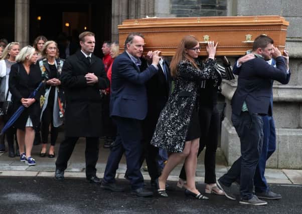 Mourners pictured at the funeral of Brendan Duddy at St Eugene's Cathedral in Londonderry
