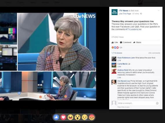 Screengrab taken from Facebook Live broadcast, hosted by ITV News of Prime Minister Theresa May answering questions sent in by users of the social media website, with presenter Robert Peston.