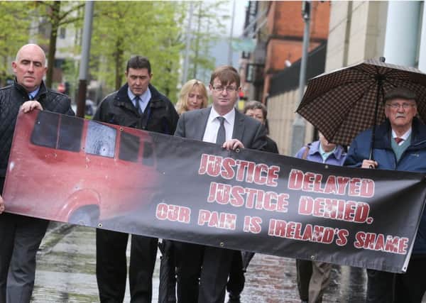 Willie Frazer with family and friends arrive at Laganside Court on Monday.
Photo Colm Lenaghan/Pacemaker Press