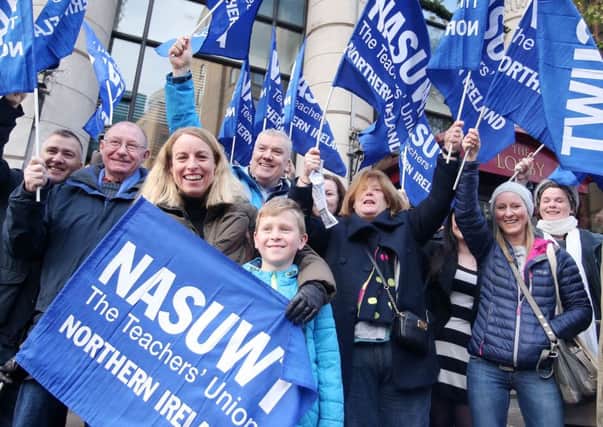 Teachers from the NASUWT take part in a one-day strike in November last year as part of a dispute over pay and workload