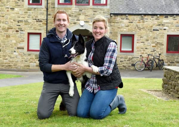 Brian White and Aoife Smith with their 9,200gns top price Skipton dog, Moss. Picture: Adrian Legge Photography
