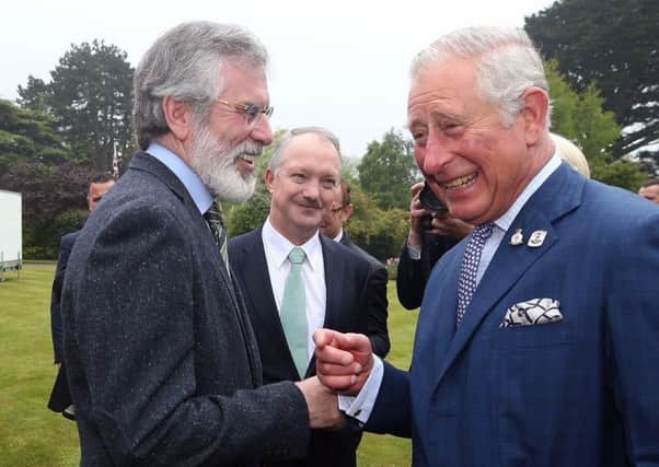 (Left-right) Sinn Fein leader Gerry Adams and the former Fianna Fail TD Sean Haughey meet the Prince of Wales during a reception at Glencairn House, Dublin, where Prince Charles spoke about 1916. Photo: Damien Eagers/PA Wire