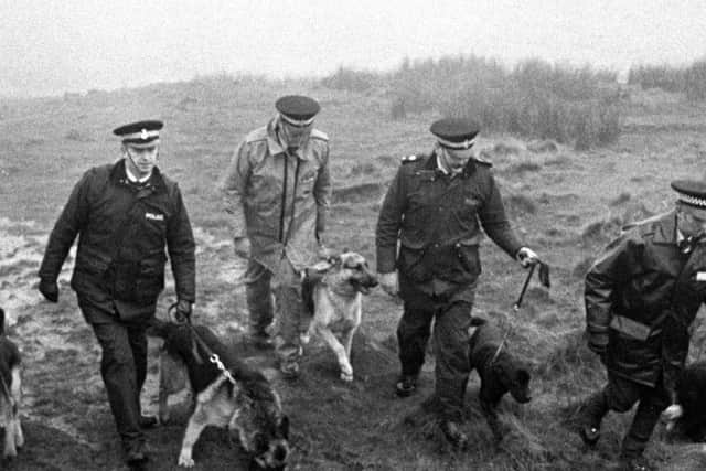 File photo dated 20/11/1986 of police using specially trained sniffer dogs on Saddleworth Moor, near Oldham, to search for Keith Bennett, one of the victims of moors murderer Ian Brady,
