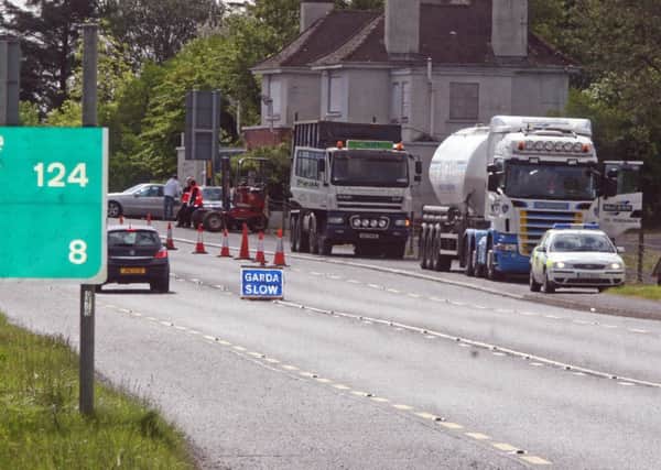 Gardai and customs officers carrying out checks on the southern side of the Irish border