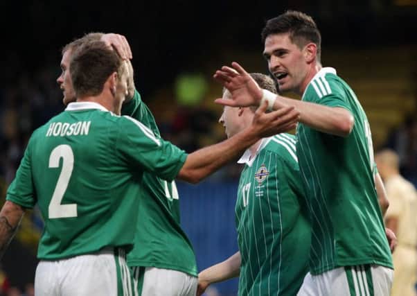 Kyle Lafferty (right) in action for Northern Ireland with international team-mate Lee Hodson.