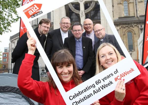 Helen Newell (left) and Rosamond Bennett of Christian Aid Ireland with church representatives Canon Mark Niblock, Rt Rev Dr Frank Sellar, Fr Martin Magill, Rev Brian Anderson and Rev Richard Johnston at the launch of Christian Aid Week 2017
