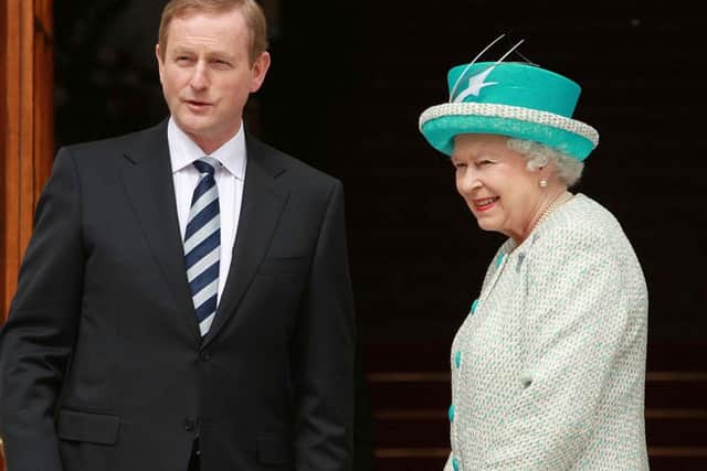 File photo dated 18/05/11 of Queen Elizabeth II with Irish Taoiseach Enda Kenny at Government Buildings during the second day of her State Visit to Ireland