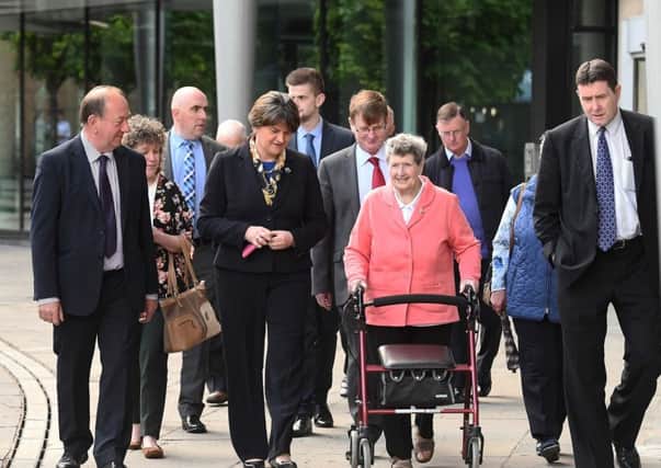 DUP Leader Arlene Foster arrives  at court  with families and friends of those killed in the Kingsmill Massacre