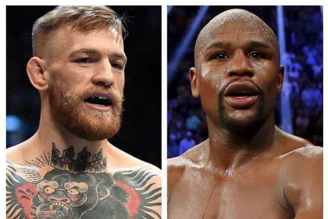 Conor McGregor (left) and Floyd Mayweather Jnr.