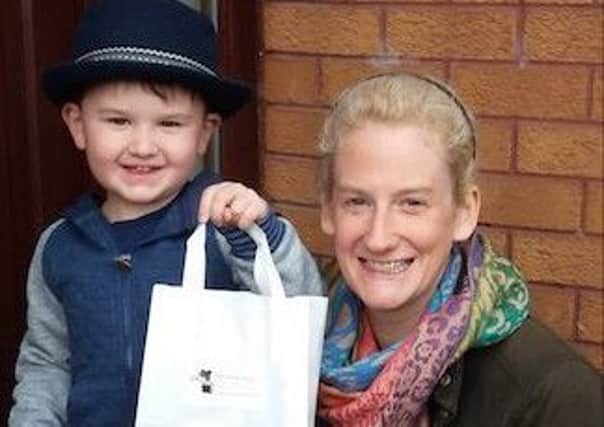 Reuben and Lindsay ready to make a special delivery of a bag to a local PND sufferer.