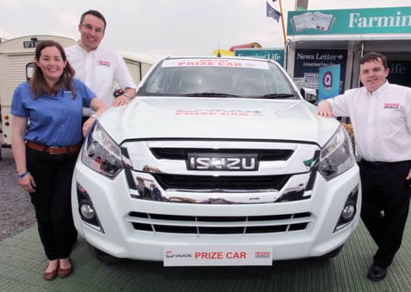 Left to right are Gillian Devaney, Farming Life, with MD William Brown and Sean Dunne of Isuzu UK