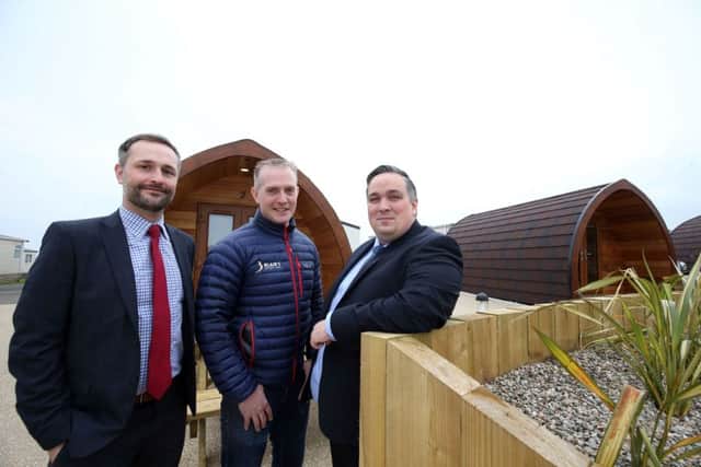 Mark Sproule, business acquisition manager at Danske Bank with Blairs Holiday Park managing director Colin Mayrs and Aaron Ennis, head of north business centre at Danske Bank.