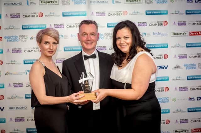Hugh Hegarty presents the Best Tourism Event award to Helena Hasson and Jacqueline Whoriskey of the Foyle Maritime Fetival