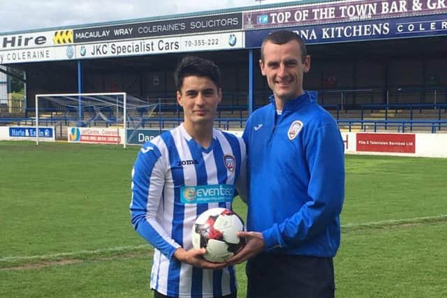 Coleraine manager Oran Kearney pictured with new signing Aaron Traynor.