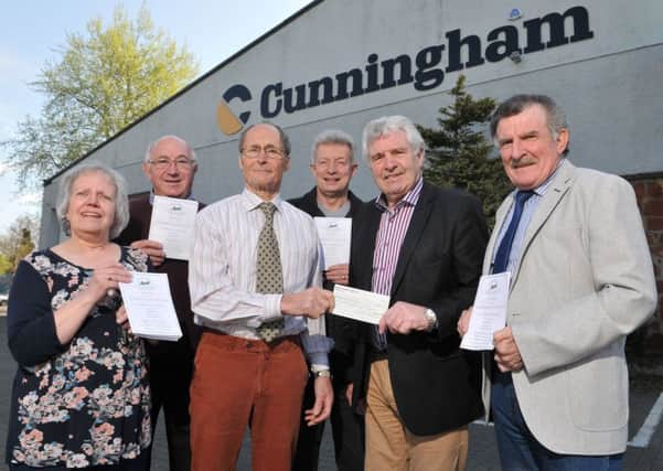 Gordon Cunningham CEO of Cunningham Covers Maghera pictured as he hands over a sponsorship cheque for the 2nd annual Maghera Agri Show and Country Fayre to be held on Saturday the 5th August to James Armour Show Chairperson. Included in the picture are Carol Collier (Secretary), Raymond McNamee (Treasurer), Kevin Daily (Committee Member) and Matt Rafferty (Vice-Chairperson).INMM1917-301