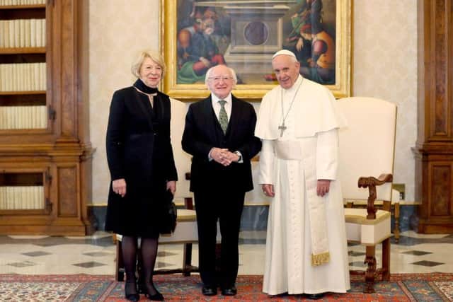 Handout photo issued by Maxwell Photography of Sabina Higgins, Irish President Michael D Higgins and Pope Francis in the Vatican City