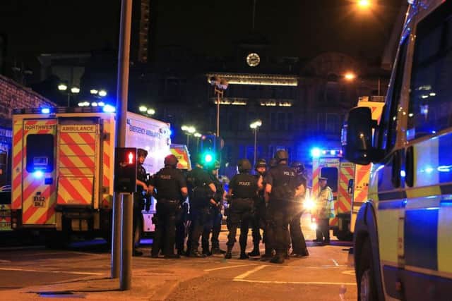 Armed police at Manchester Arena after the  explosion