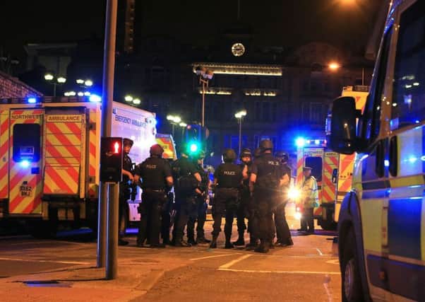 Armed police at Manchester Arena after reports of an explosion at the venue during an Ariana Grande gig. (Peter Byrne/PA Wire)
