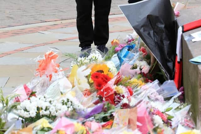 Flowers left at the Scene in Manchester