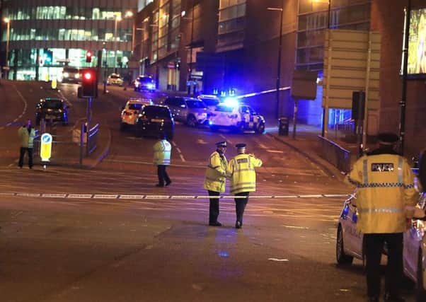 Emergency services arriving at Manchester Arena on Monday night after reports of an explosion at the venue