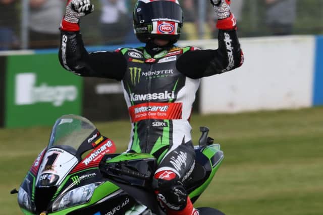 Jonathan Rea celebrates his win in race two at Donington Park - Kawasaki's 100th World Superbike victory.