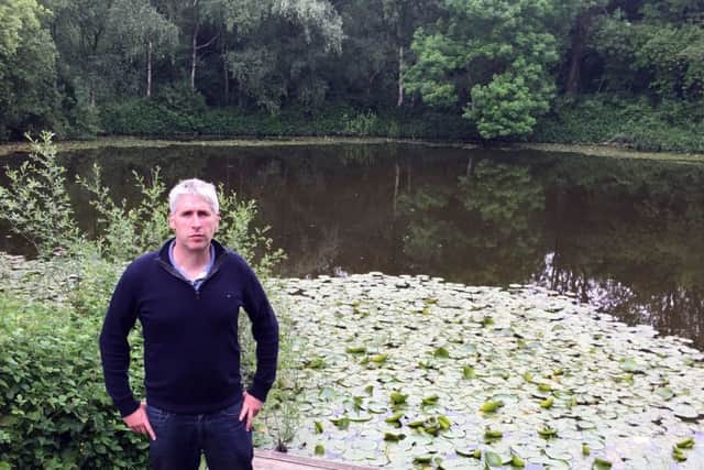 David Young at Pool of Peace - a crater left by underground mine near Messines