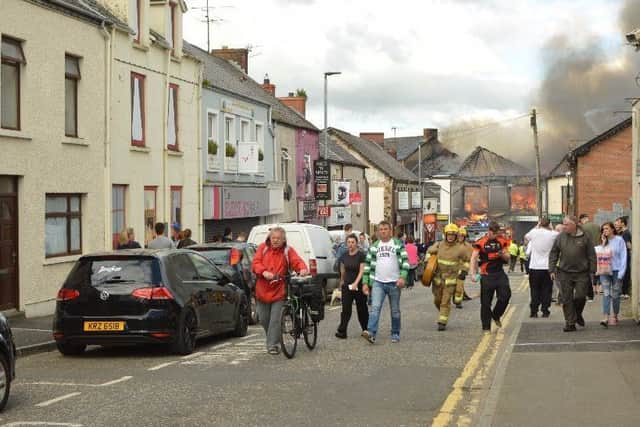People move away ftrom the scene of the fire. Pic: Dylan Stephens