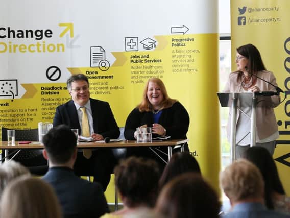 Party leader Naomi Long (centre) and deputy leader Stephen Farry at the launch of the Alliance Party manifesto at CIYMS, Belfast, for the upcoming General Election