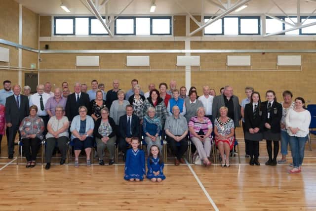Community representatives and guests in the new facility at Harryville