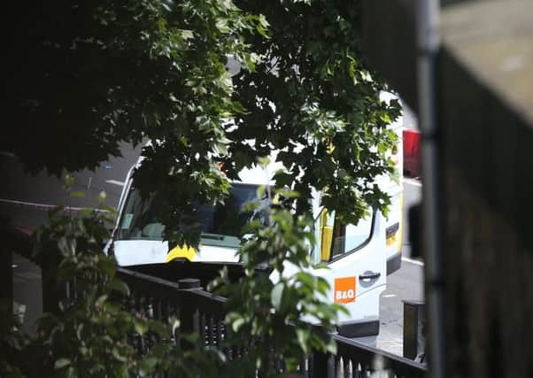 The van used by three attackers which was driven onto London Bridge, striking pedestrians, before they went on a stabbing rampage in nearby Borough Market