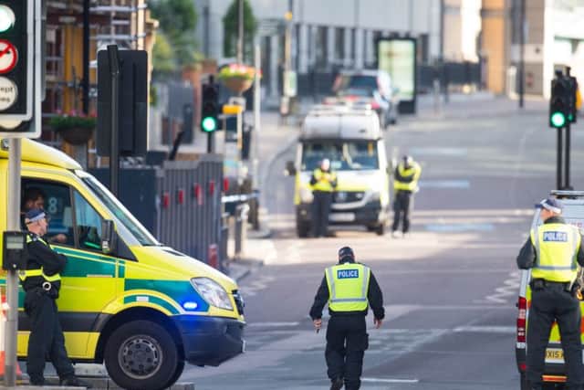 Police on Southwark Bridge Road, London, near the scene of last night's terrorist incidents in London Bridge and Borough Market.