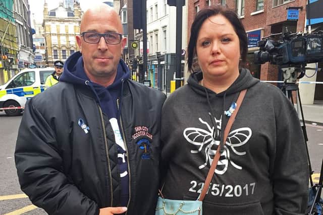 Charlotte Campbell and Paul Hodgson, the mother and stepfather of Olivia Campbell-Hardy, 15, who died in the bombing at the Ariana Grande concert on May 22, as they laid flowers in Borough High Street in memory of those killed in the London Bridge attack.