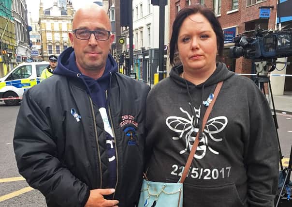Charlotte Campbell and Paul Hodgson, the mother and stepfather of Olivia Campbell-Hardy, 15, who died in the bombing at the Ariana Grande concert on May 22, as they laid flowers in Borough High Street in memory of those killed in the London Bridge attack.